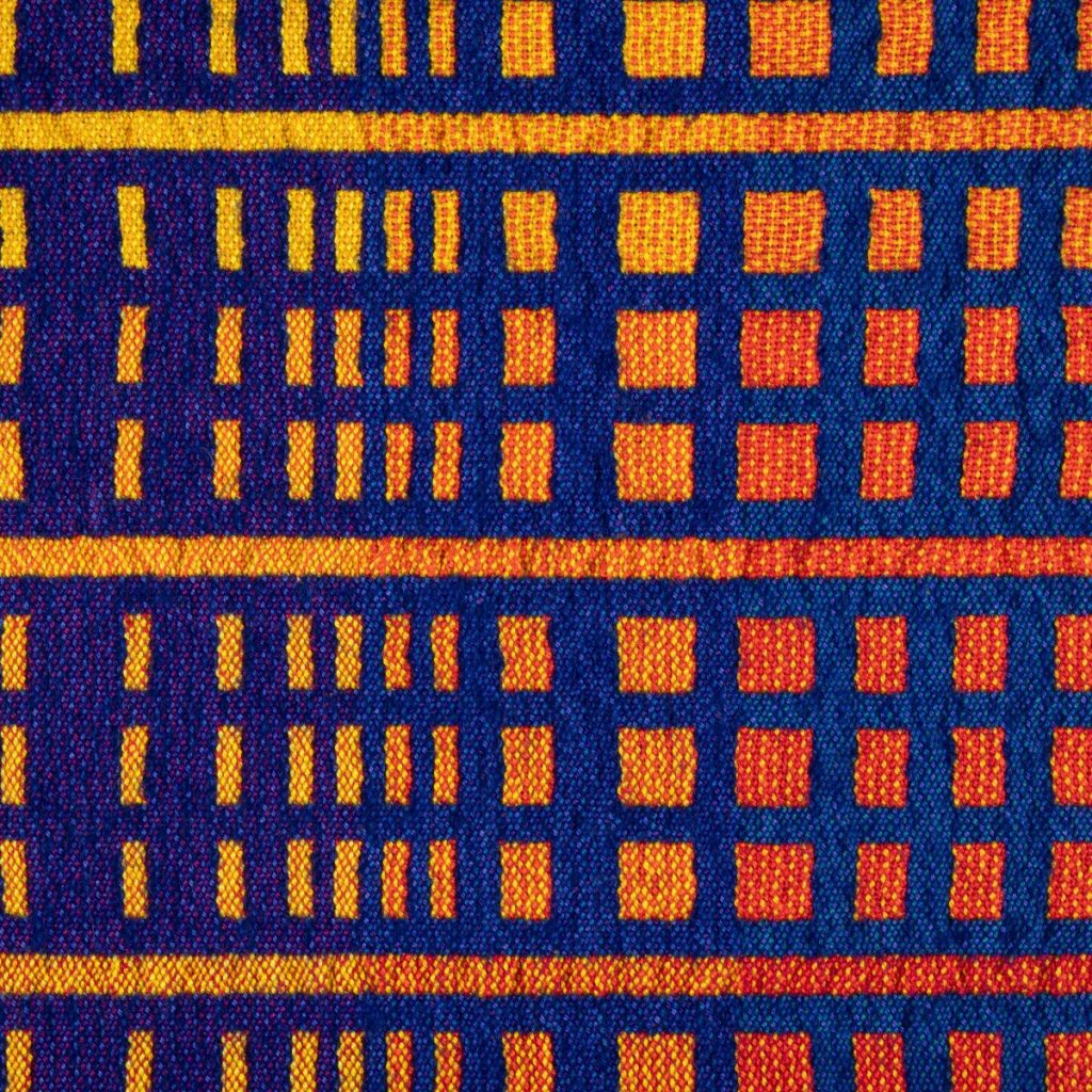Photo of a block design woven on a countermarche loom with eight shafts
